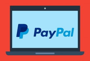 Grafik eines Notebooks mit großen PayPal-Logo auf dem Display